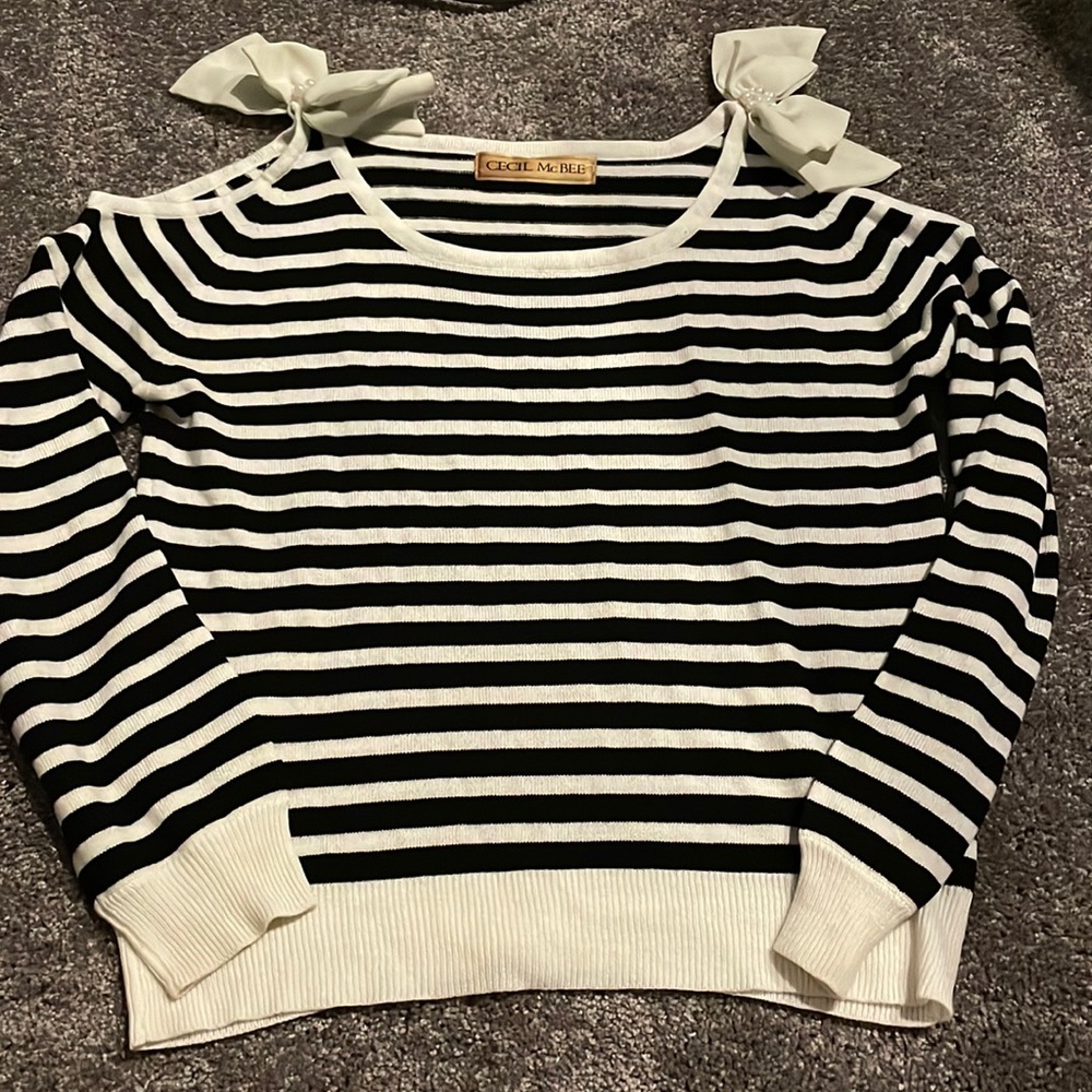 Open shoulder sweater